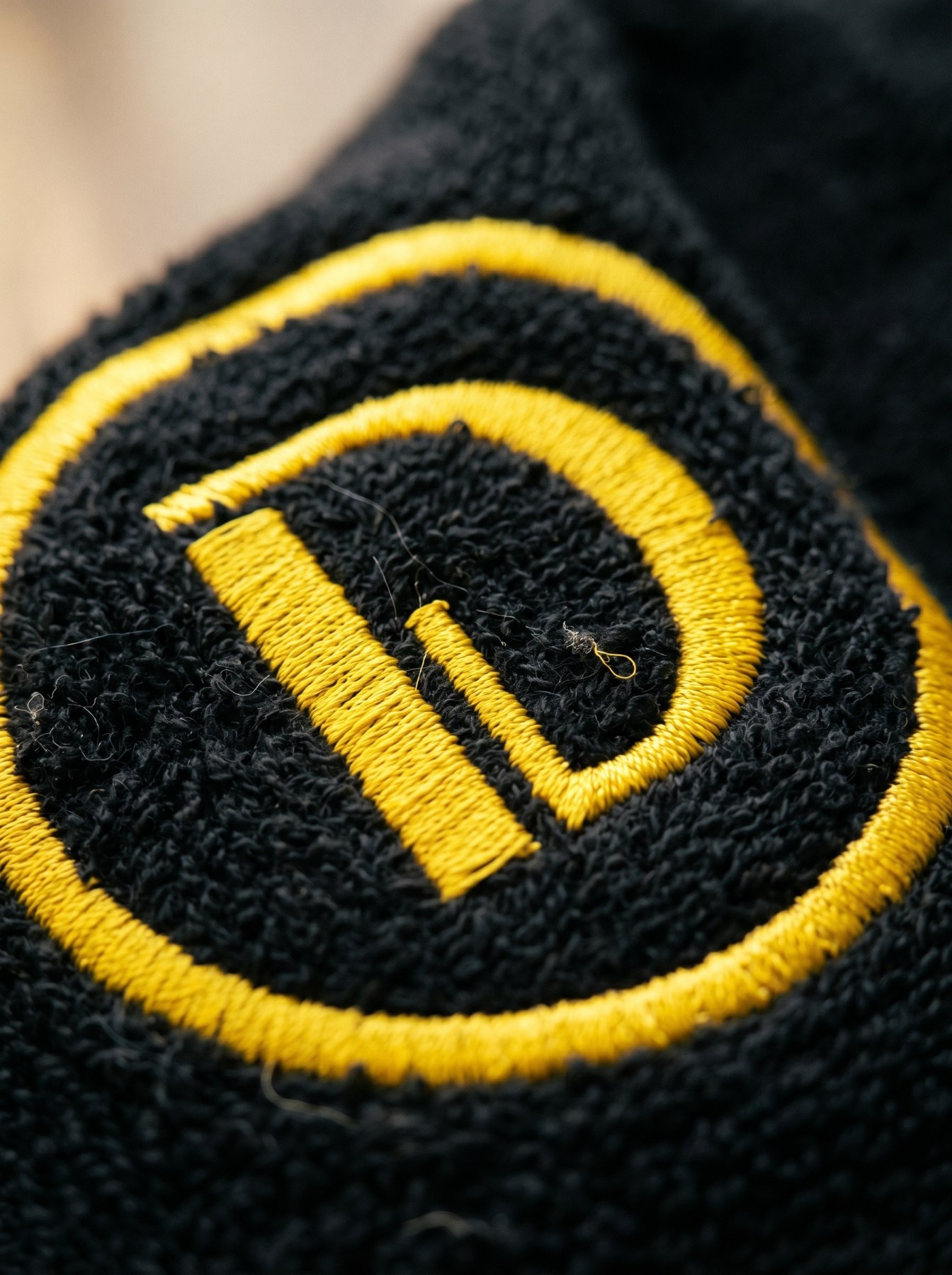 Detalhe do bordado da Deluxe